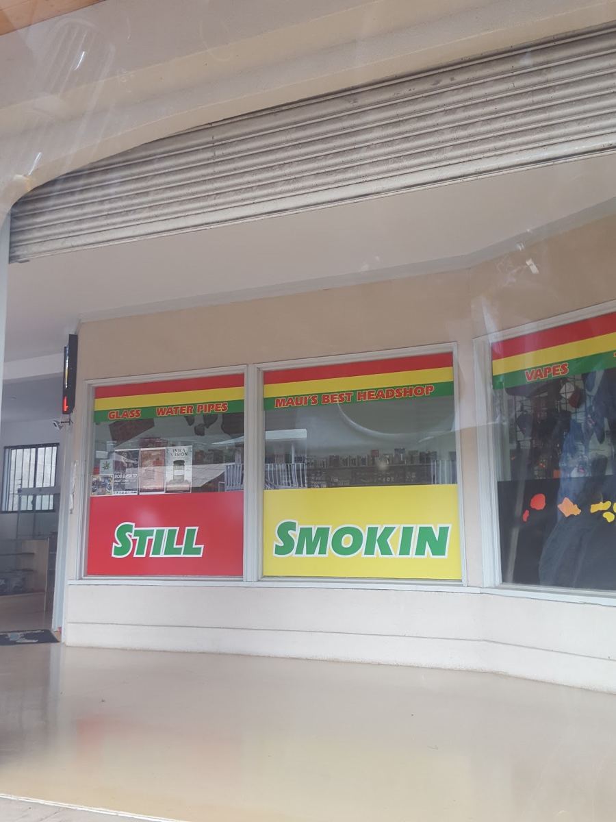 The Still Smokin' sign